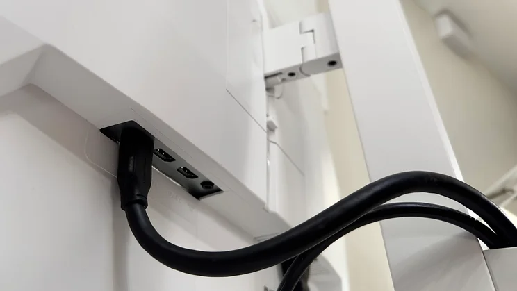 A close up of the rear of the Philips Evnia 27M2N3501PA, showing ports and cable clip