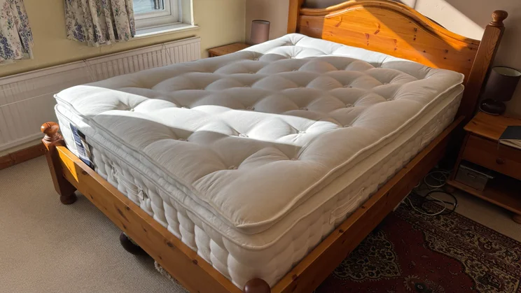 The Happy Beds Annabel mattress on a bed in a bedroom