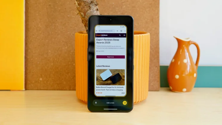 CMF Phone 2 Pro leaning against a plant pot, display showing the Essential Space screenshot feature
