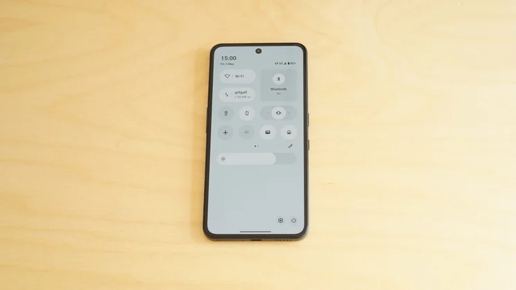 CMF Phone 2 Pro lying face up on a worktop with the display showing the control centre