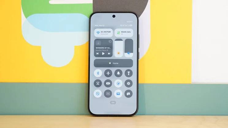 Poco X8 Pro leaning against a wall, displaying the control centre