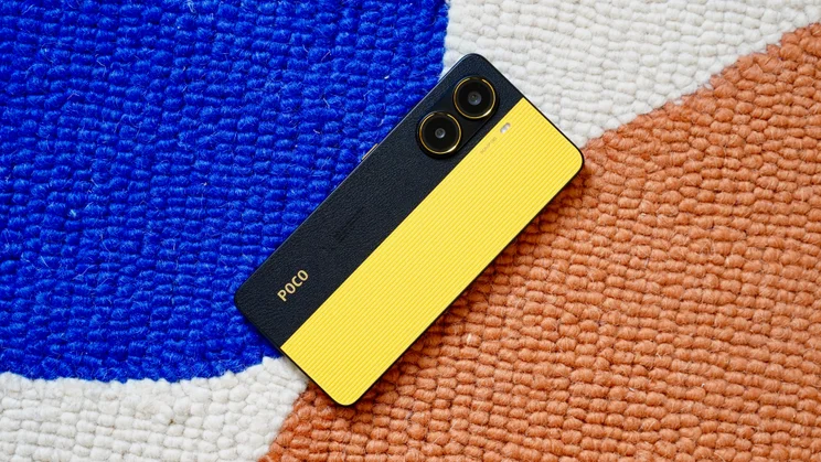 Xiaomi Poco X7 Pro on a multi-coloured rug, rear view