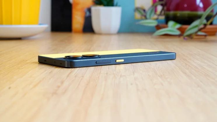 Xiaomi Poco X7 Pro face down on a table, angled side view