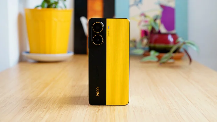 Xiaomi Poco X7 Pro standing upright on a table, rear view