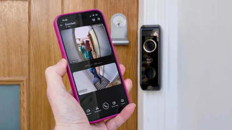 An Expert Reviews writer testing a video doorbell with their phone