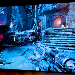 An image showing a Panther Lake reference platform running the Painkiller game at high framerate