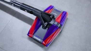 A close up of the Dyson PencilVac's quad cone fluffy floor head