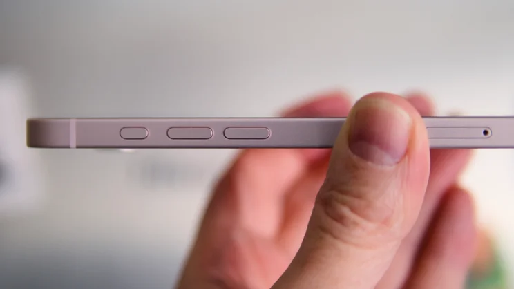 A clowe up on the volume and Action buttons on the Apple iPhone 17e