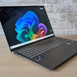 The Acer Swift 16 AI, open, pictured from the front left quarter