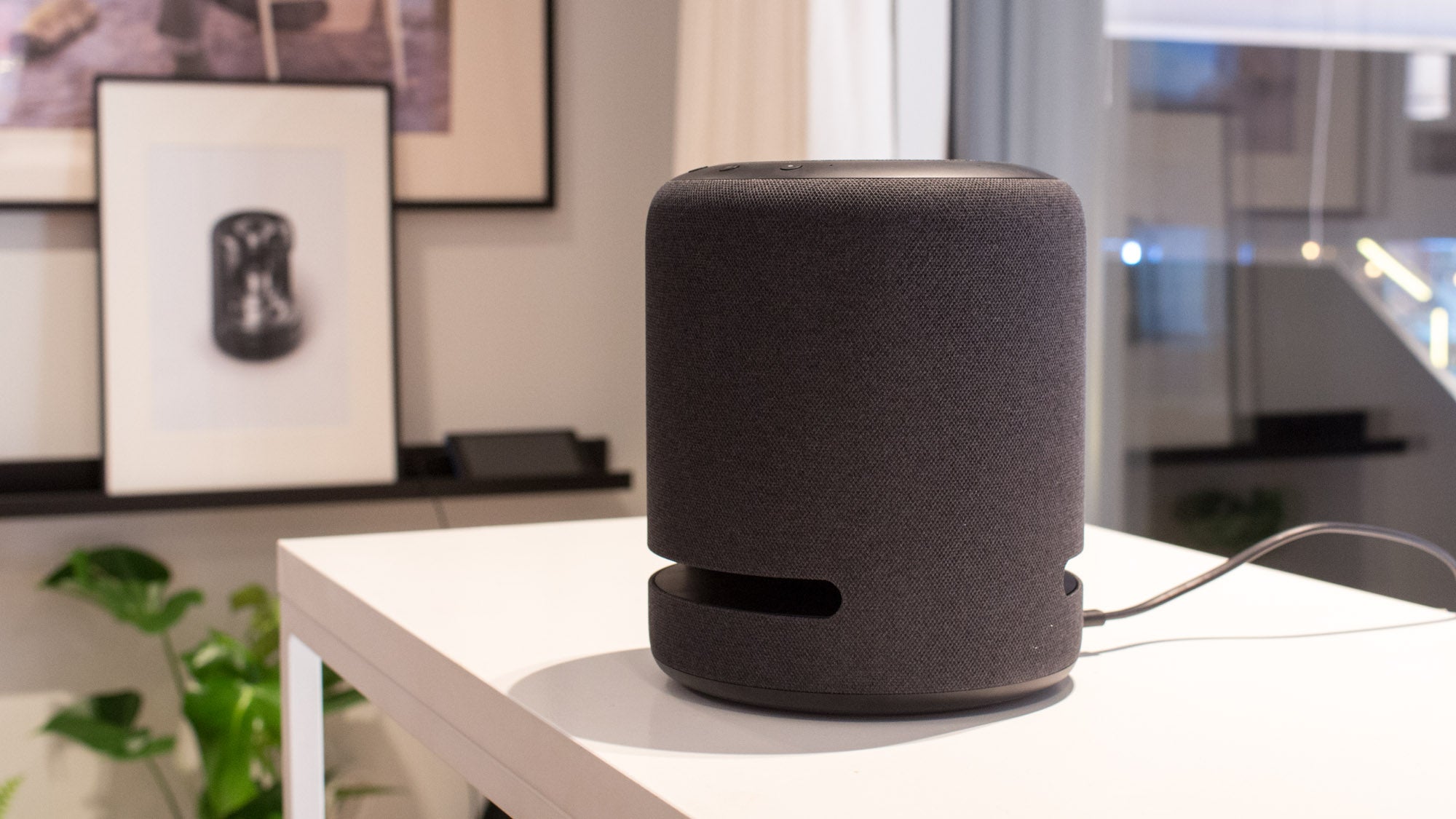 Amazon Echo Studio in charcoal on a white breakfast bar