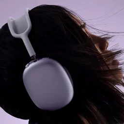 Apple AirPods 2 in purple being worn