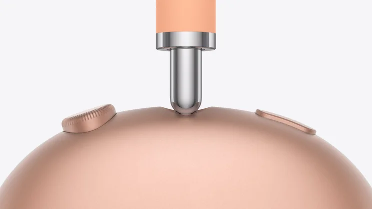 Apple AirPods Pro 2 in orange - close up of controls on right earcup