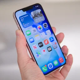 The Apple iPhone 17e pictured being held at a slight angle