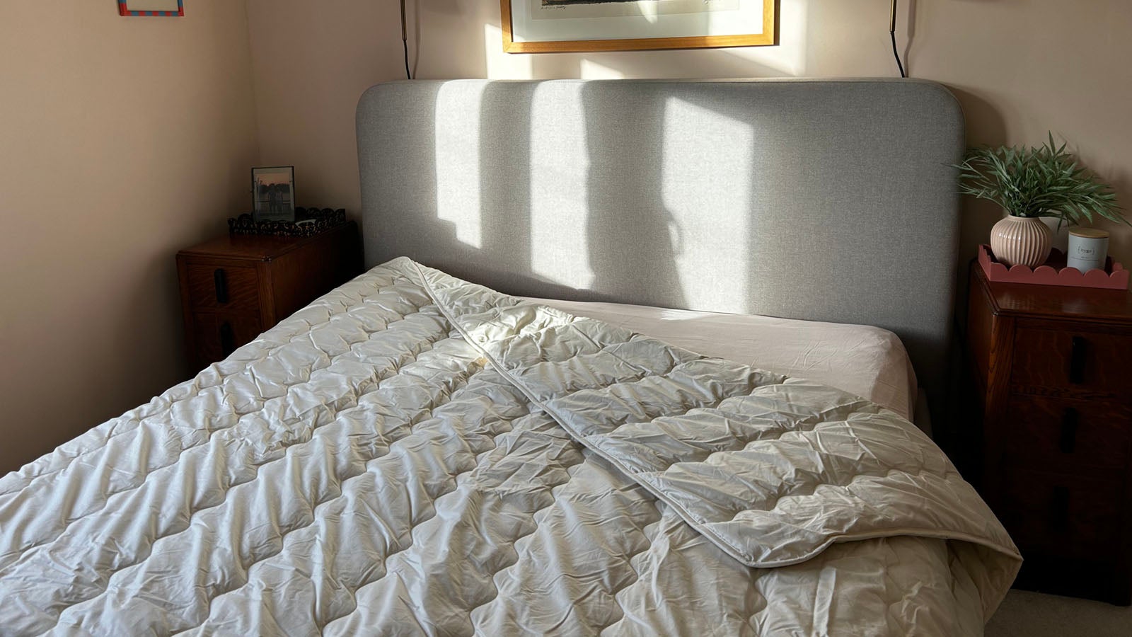 Ava Innes Luxury Cashmere and Wool 12+ Tog Duvet in a warmly lit bedroom