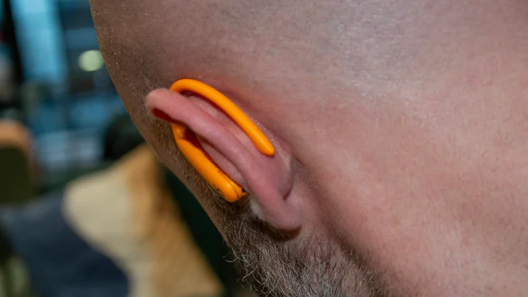 Beats Powerbeats Pro 2 in ear, showing the earhook