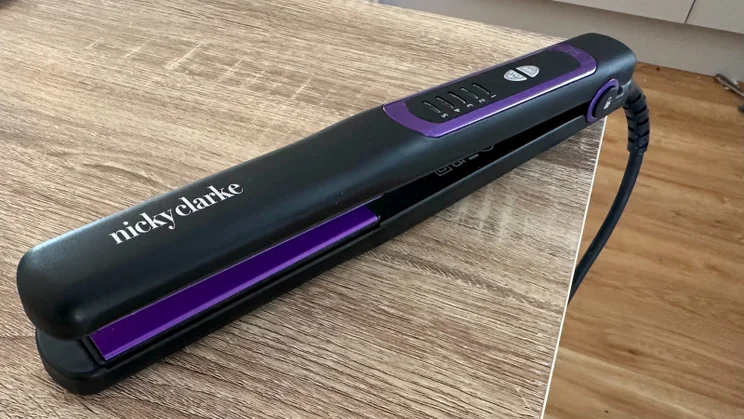 best hair straightener Nicky clark hair straighteners on a wooden table