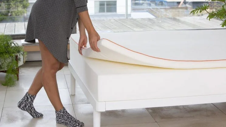 Dormeo Octasmart Essentials mattress topper on a showroom bed