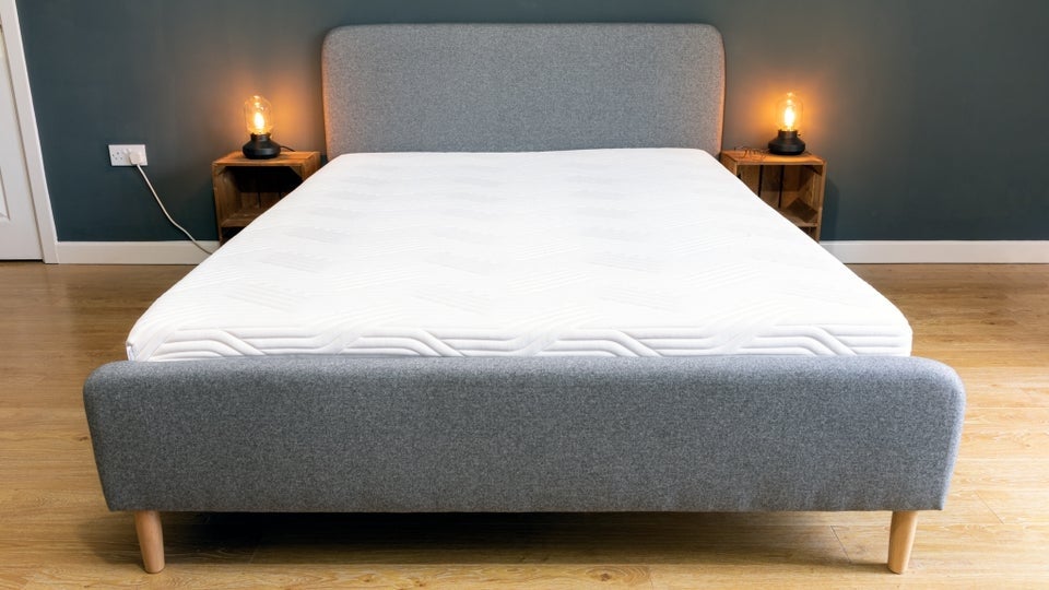 Bed with Tempur Original Supreme mattress in room