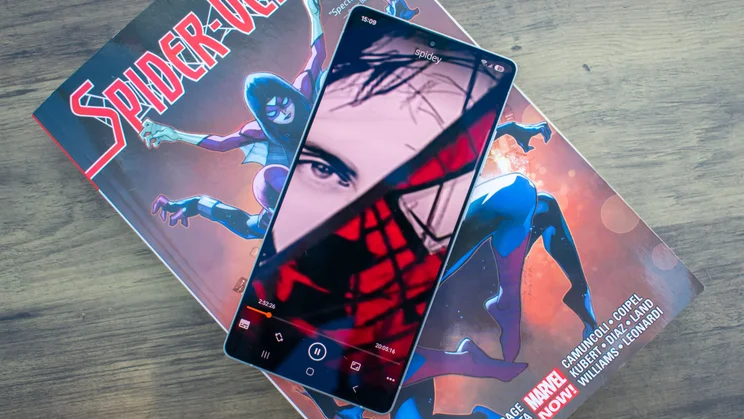 Phone playing Spider-Man 2 sat on a Spider-Man comic