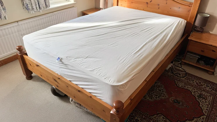 The Nectar mattress Protector on a bed in a bedroom