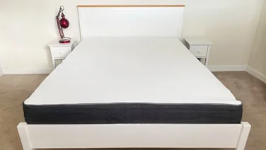 A mattress on a bed frame