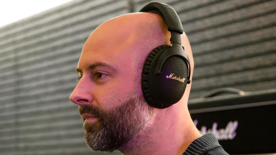One of the Expert Reviews team testing a pair of Marshall over-ear headphones