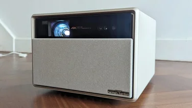 Best projector featured image - XGIMI Horizon Ultra 4K projector on a hardwood floor