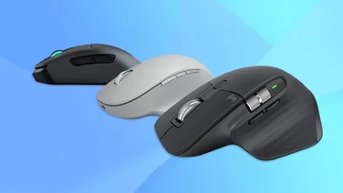 A trio of wireless computer mice on a blue background