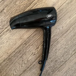 Boots 1500W Travel Dryer review side of hairdryer with handle unfolded