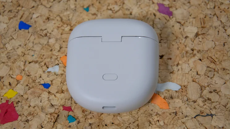 Rear view of the Bose QuietComfort Ultra Earbuds 2nd Gen's charging case on a cork table