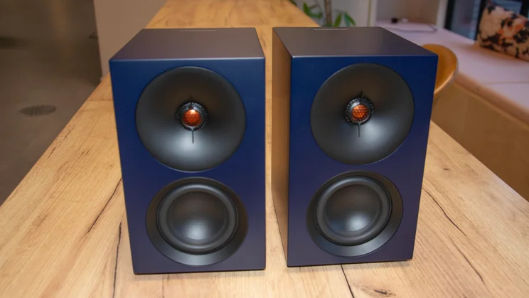The Cambridge Audio L/R S active speakers side-by-side on a wooden table