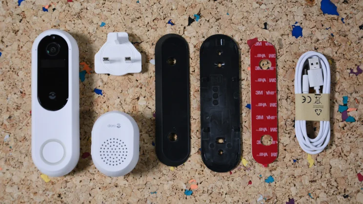 Doro Hemma Doorbell box contents, laid out on a cork surface