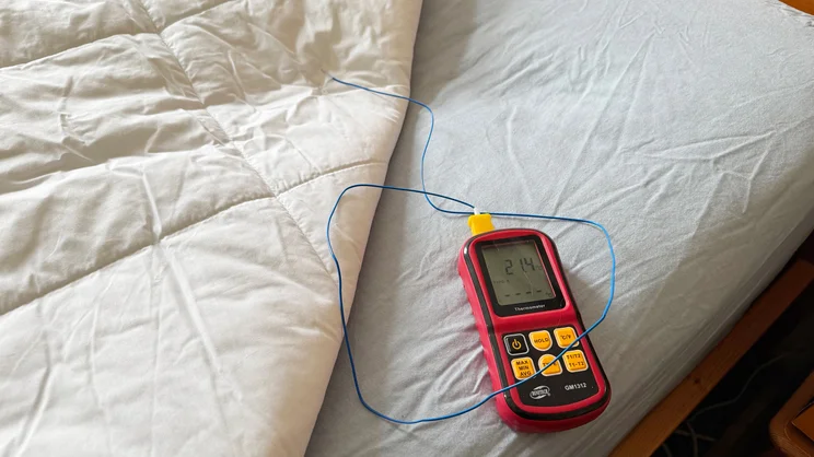 A thermocouple and temperature probe being used to test the temperature of the Dreamland Love Mornings Heated Duvet