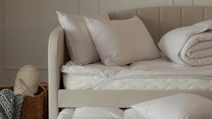 Feels Like Down Pillows in the corner of a sofa