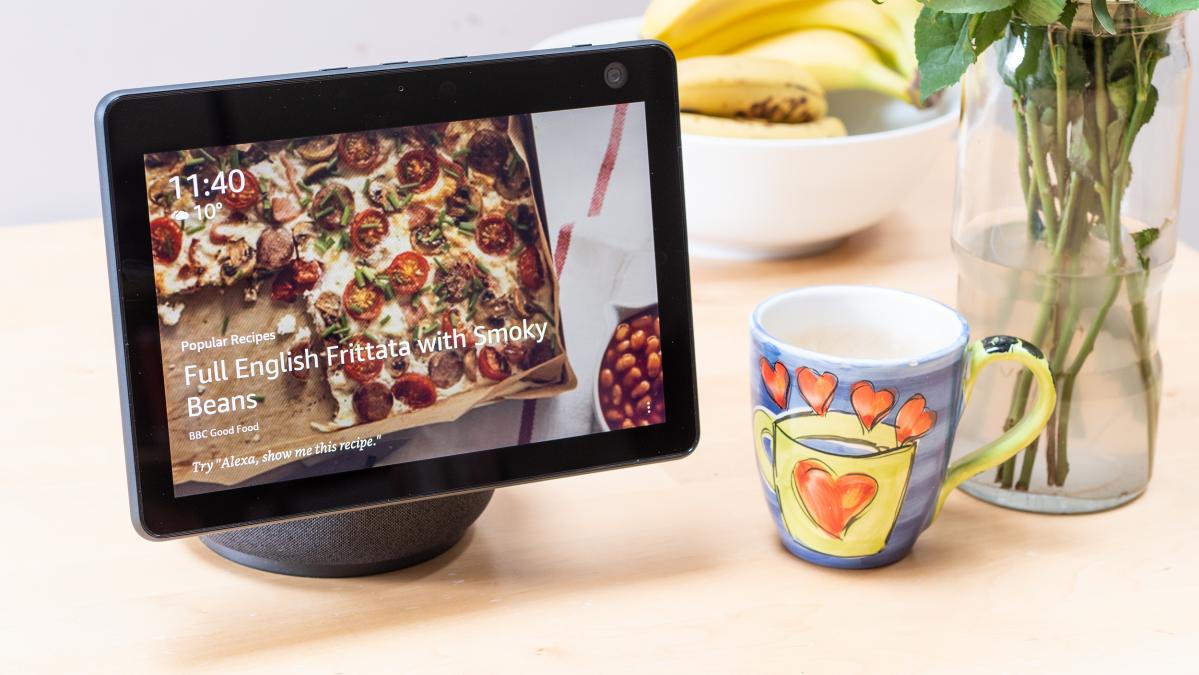 Amazon Echo Show 10 on a table next to a brew