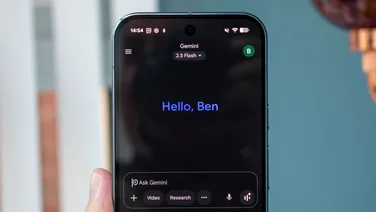 Google Pixel 10 Pro in hand, showing Google Gemini on the display