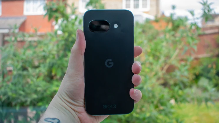 Google Pixel 9a in hand, rear view