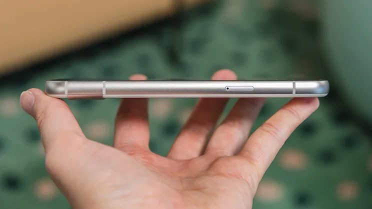 google pixel 9a review phone held to show side