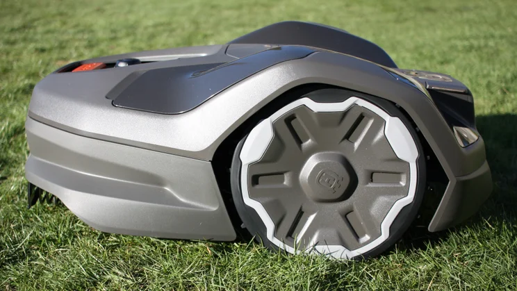 The Husqvarna Automower 305E NERA pictured from the right side