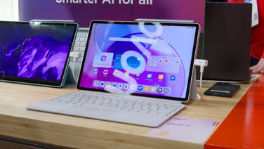 A photograph of the Lenovo Idea Tab Pro Gen 2 on the Lenovo stand at MWC 2026