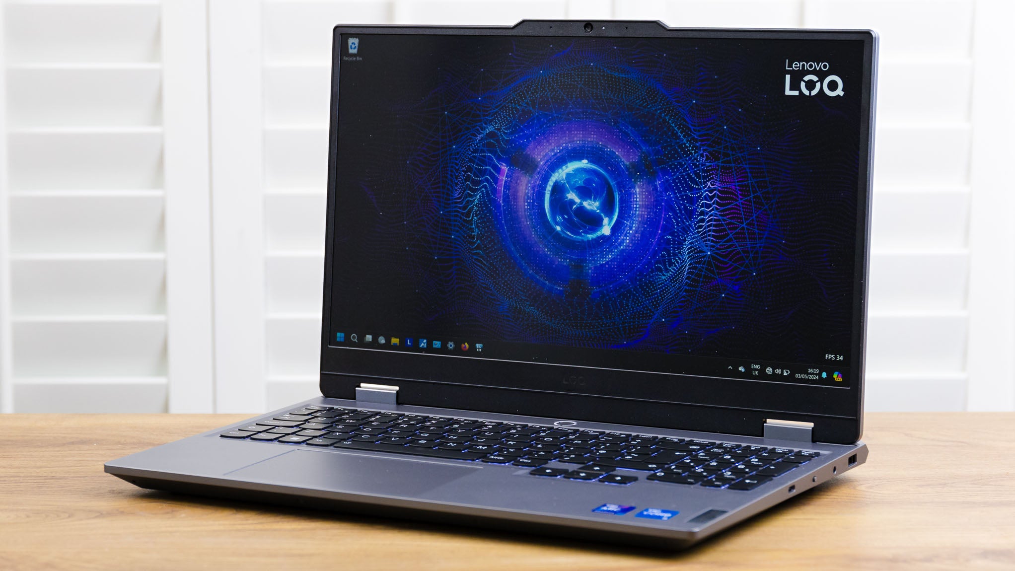 Image of the Lenovo LOQ 15IAX9I at an angle with its lid open