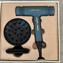 mdlondon Blow 2025 - in its box on the floor, lid off with attachments visible