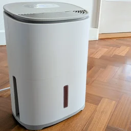The Meaco Arete One 6L dehumidifier on a hardwood floor