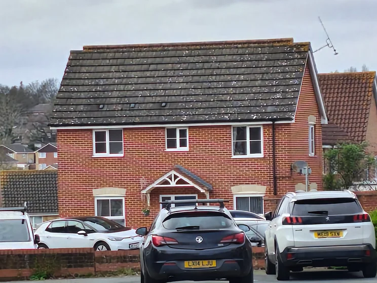 10x zoom of a red house
