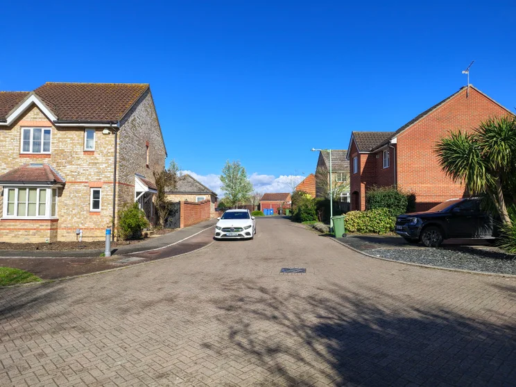 Quiet street with houses on both sides