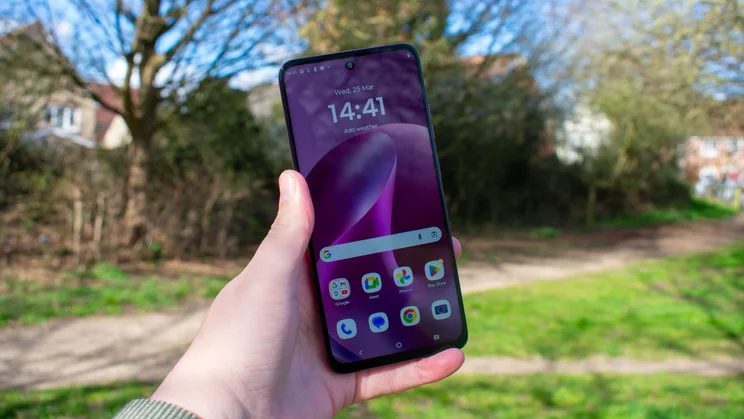 Motorola Moto G17 in hand, front view