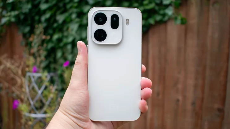 Oppo Find X9 Pro in hand, rear view