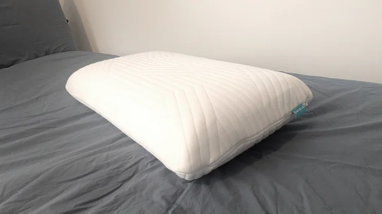 the Origin Coolmax Latex Pillow on a mattress
