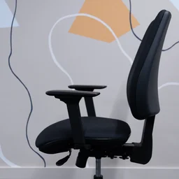 The Posturite Homeworker Plus office chair viewed from the side, in an office against a wall
