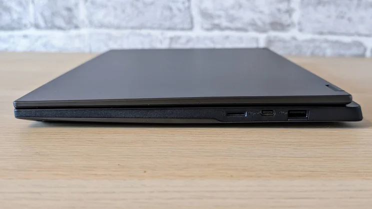 The Asus TUF Gaming A14 RTX 5060 laptop pictured from the right edge, closed